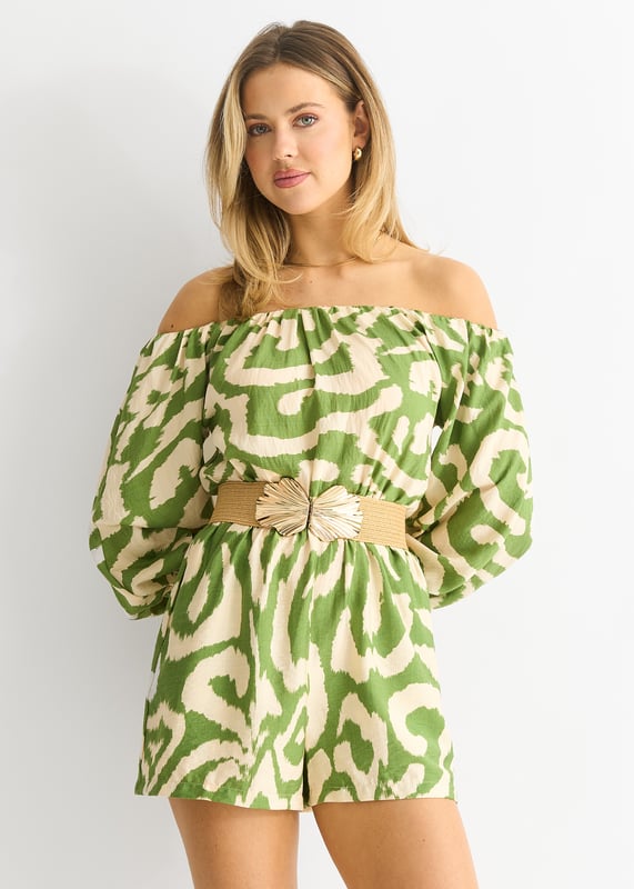 Dress to impress in our Green Abstract Belted Bardot Viscose Playsuit. Featuring an eye-catching abstract design and a flattering belted waist, this playsuit is perfect for any special occasion. Made with soft and lightweight viscose fabric, you'll feel comfortable and elegant all day or night.