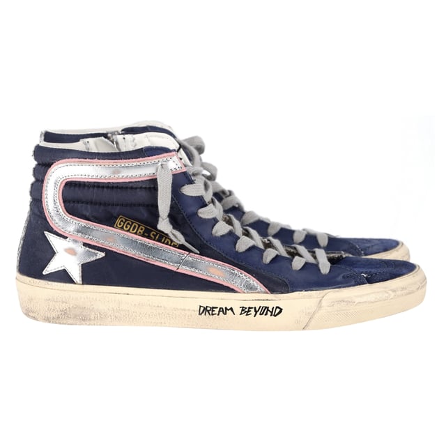 VINTAGE, RRP AS NEW
The Golden Goose Slide High-Top Sneakers in navy blue suede and leather combine luxury with laid-back style, featuring a distressed, vintage-inspired look that adds effortless cool to any outfit. Crafted with premium materials, these sneakers offer both comfort and durability, while the high-top design provides extra support and style. Pair them with skinny jeans or a casual dress for a chic, street-style look, or wear them with leggings for a sporty vibe. Add a leather jacket and minimalist accessories to complete the edgy, fashion-forward ensemble.

 Golden Goose Slide High-Top Sneakers in Navy Blue Suede and Leather

Condition: Excellent
Signs of wear: Include Box., No visible sign of wear. No Mark at insole.,  Very light mark at soles.
Packaging: Box, Dust bag
Color: Blue | navy blue
Material: Suede
Size: EU | 42
Measurements: Heel height: 120; Insole length: 280
SKU: NAPPUGBSH463289W