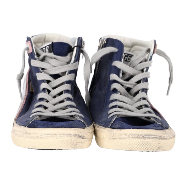 VINTAGE, RRP AS NEW
The Golden Goose Slide High-Top Sneakers in navy blue suede and leather combine luxury with laid-back style, featuring a distressed, vintage-inspired look that adds effortless cool to any outfit. Crafted with premium materials, these sneakers offer both comfort and durability, while the high-top design provides extra support and style. Pair them with skinny jeans or a casual dress for a chic, street-style look, or wear them with leggings for a sporty vibe. Add a leather jacket and minimalist accessories to complete the edgy, fashion-forward ensemble.

 Golden Goose Slide High-Top Sneakers in Navy Blue Suede and Leather

Condition: Excellent
Signs of wear: Include Box., No visible sign of wear. No Mark at insole.,  Very light mark at soles.
Packaging: Box, Dust bag
Color: Blue | navy blue
Material: Suede
Size: EU | 42
Measurements: Heel height: 120; Insole length: 280
SKU: NAPPUGBSH463289W