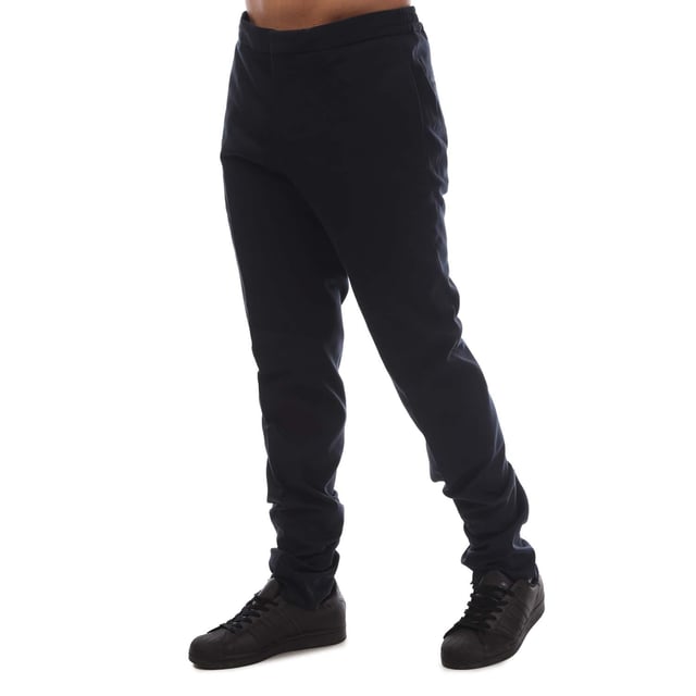 Mens BOSS T-Banson1 Trousers in dark blue.- Hook and zip closure.- Elasticated waist with inner drawcord.- Side pockets.- 94% Cotton  5% Silk  1% Elastane.- Ref: 50450146402