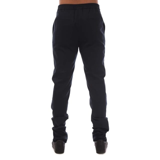 Mens BOSS T-Banson1 Trousers in dark blue.- Hook and zip closure.- Elasticated waist with inner drawcord.- Side pockets.- 94% Cotton  5% Silk  1% Elastane.- Ref: 50450146402