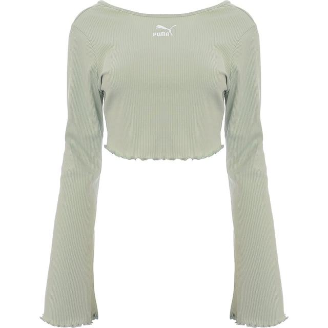 Main: 100% Cotton. The Puma Classic long flare sleeve scoop back crop top in light green is a stylish and versatile piece that's perfect for both active days and casual wear. Its form-fitting design and contrasting panels add a sporty touch, while the scoop back offers a hint of elegance. Made with a blend of cotton and elastane, it promises comfort and flexibility, making it an excellent addition to any wardrobe. Whether you're heading to the gym or meeting friends, this crop top combines fashion with function in the most delightful way.