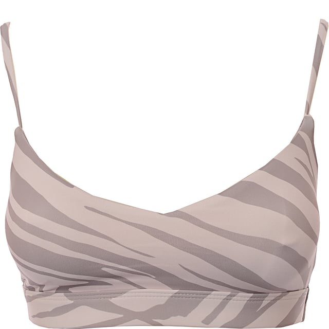 Main: 80% Polyester, Main: 20% Elastane Unleash your wild side with the South Beach x Joanna Chimonides light support strappy sports bra in mink animal print. This stylish sports bra features a bold animal print that adds a touch of fierce fashion to your workout wardrobe. Designed for light support, it is perfect for low-impact activities such as yoga, pilates, or casual wear. The strappy design not only provides a secure fit but also adds a fashionable flair. Made from a blend of 80% polyester and 20% elastane, this sports bra offers excellent stretch and durability, ensuring you stay comfortable and confident during your workouts. The collaboration with Joanna Chimonides brings a unique and trendy touch to this versatile piece.
