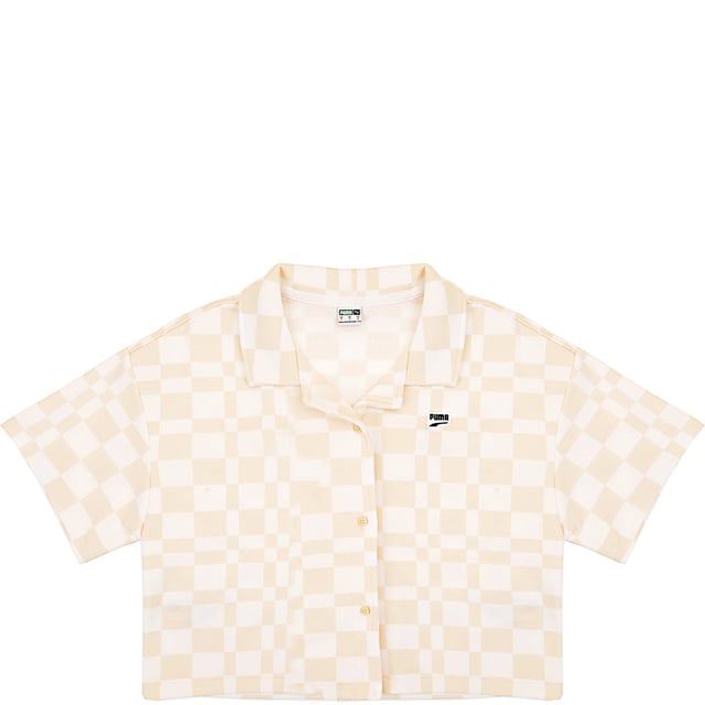 Main: 100% Cotton. The Puma Downtown checkerboard shirt is a stylish and versatile piece that combines a classic beige and white pattern with the subtle flair of small Puma branding. Its design features a smart collar and practical button fasteners, making it a perfect choice for both casual and semi-formal occasions. Whether you're heading to the office or out for a weekend event, this shirt promises to keep you looking sharp and feeling comfortable.