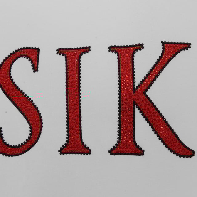 Main: 100% Cotton. The Siksilk oversized t-shirt in white with a red rhinestone logo is a bold fashion statement that combines comfort with a touch of luxury. The sparkling red rhinestones add a pop of color and a bit of glamour to the classic white tee, making it a versatile piece that can be dressed up or down. Whether you're going out with friends or just want to add some flair to your casual wear, this t-shirt is sure to turn heads and make a lasting impression.