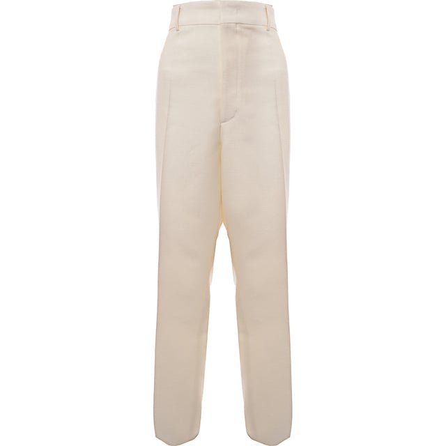 100% Virgin Wool Classic aesthetics will serve you well, particularly in smart-casual and business situations, and your tailored rotation is more than safe in the hands of Valentino. These trousers are cut from virgin wool with sharp pressed creases and a straight leg. With 2 side slip pockets, 2 back welt pockets and zip fly