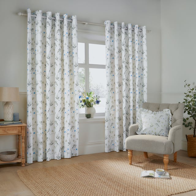 Transform your home into a tranquil retreat with Meadow Room Darkening Eyelet Curtains. Crafted from 100% cotton Panama, these curtains combine a timelessly durable finish with a delicate floral print inspired by summer meadows, bringing a natural serenity to any interior. Their soft hues complement modern and classic decor alike, creating a harmonious blend of style and warmth. Designed for easy hanging with their convenient eyelets, they gently filter light to produce a cosy and inviting atmosphere. Perfect for those who value thoughtful design and the beauty of nature, these curtains add a refined touch to your living space.
