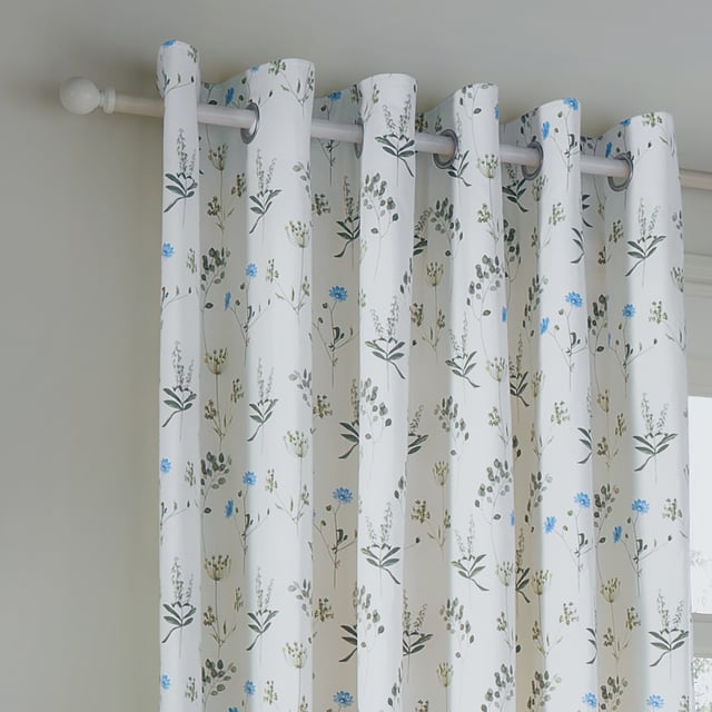 Transform your home into a tranquil retreat with Meadow Room Darkening Eyelet Curtains. Crafted from 100% cotton Panama, these curtains combine a timelessly durable finish with a delicate floral print inspired by summer meadows, bringing a natural serenity to any interior. Their soft hues complement modern and classic decor alike, creating a harmonious blend of style and warmth. Designed for easy hanging with their convenient eyelets, they gently filter light to produce a cosy and inviting atmosphere. Perfect for those who value thoughtful design and the beauty of nature, these curtains add a refined touch to your living space.