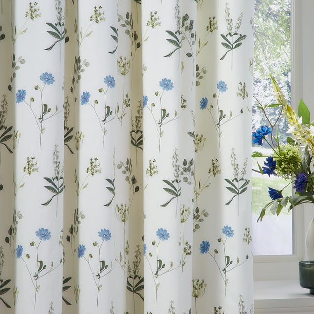 Transform your home into a tranquil retreat with Meadow Room Darkening Eyelet Curtains. Crafted from 100% cotton Panama, these curtains combine a timelessly durable finish with a delicate floral print inspired by summer meadows, bringing a natural serenity to any interior. Their soft hues complement modern and classic decor alike, creating a harmonious blend of style and warmth. Designed for easy hanging with their convenient eyelets, they gently filter light to produce a cosy and inviting atmosphere. Perfect for those who value thoughtful design and the beauty of nature, these curtains add a refined touch to your living space.