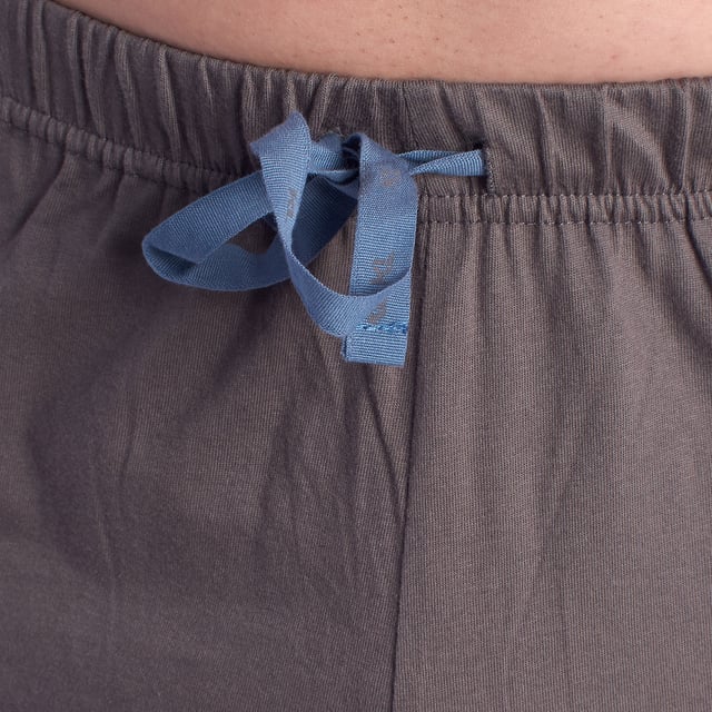 Short-sleeved and short-pants pajamas, model KL30000.

 The men's pajamas combine a short-sleeved round-neck T-shirt and shorts.
 Made of soft and breathable materials, it ensures comfort throughout the night.
 Ideal for any season, this set offers a perfect balance between style and comfort for a restful night's sleep.

 Exclusive designs and a variety of prints: The men's summer pajamas are available in a wide range of exclusive designs and prints, allowing you to choose from different styles that reflect your personality and taste. From prints to stripes, each pajama offers a unique and special touch.

 Easy Care & Durability: Made from durable cotton, the men's pajamas are easy to machine wash and maintain their softness, color and shape wash after wash. This easy maintenance ensures that the pajamas remain a favorite item in your wardrobe, offering durability and practicality over time, especially during the warmer seasons.

 Men's summer pajamas, the perfect gift for Father's Day, anniversary, Christmas, New Year, birthday, and much more!

 Choose style, quality and comfort with Kisses&Love!
 Composition: 100% Cotton
 Care:
Wash at maximum temperature 30º.
 Dry at low temperature.
 Do not use bleach.
 Do not iron.
 Do not dry clean.