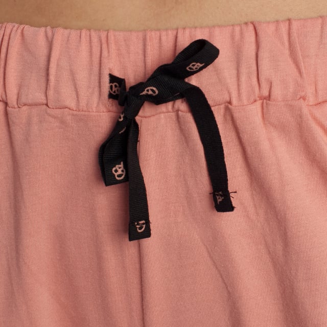 The 100% Cotton women's summer pajamas are the perfect choice to enjoy freshness and comfort during warm summer nights. This pajama set combines lightness, softness and breathability in a garment specifically designed to offer maximum comfort during the summer season.

 Main Features:
 Cool and Breathable Fabric: Made entirely of cotton, this pajama ensures a cool and light feeling against the skin, allowing optimal air circulation to keep the body cool during hot nights.

 Summer Design: The pajamas feature a light and comfortable design, ideal for warm climates, allowing you to move freely and comfortably during your night's rest.

 Short Sleeve or Sleeveless: Available in short sleeve or sleeveless options, providing options based on personal preference to suit different lounge styles.

 Loose Fit: Cut to allow for freedom of movement, these pajamas offer a comfortable, relaxed fit for a restful night's sleep.

 The 100% Cotton women's summer pajamas are the ideal choice for those looking for freshness, comfort and functionality in their sleepwear during the summer season. With its breathable fabric, summery design and loose fit, these pajamas guarantee a pleasant and refreshing experience with every use.
 Composition: 100% Cotton
 Care:
Washing machine safe at maximum temperature of 30º.
 It does not resist bleach or any other chlorate.
 Does not withstand dry cleaning.
 It does not resist the dryer.