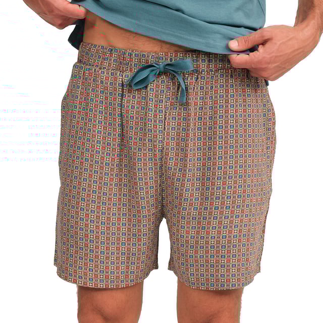 Enjoy a restful night's sleep in this stylish and comfortable men's pyjama set. Designed to provide maximum comfort without compromising on style, this men's pyjama set combines a short-sleeved T-shirt with shorts, perfect for lazy nights and relaxing at home.

 Details:

 T-shirt:
 - Relaxed fit.
 - V-neck.
 - Short sleeve.
 - Lightweight and breathable fabric.

 Short:
 - Short and baggy.
 - Side pockets.
 - Adjustable elastic waistband with drawstring.
 - Light and cool fabric for the warmest nights.
 - Tone-on-tone visible seams.

 For those seeking a restful night's sleep, J and J Brothers's luxurious short sleeve pyjama sets are just the ticket. Crafted from the finest fabrics and with an attention to detail unmatched in the industry, these comfortable and stylish men's short sleeve pyjamas will ensure you get a luxurious night's sleep each and every night.
 Composition: T-shirt: 100% Cotton; Shorts: 100% Viscose
 Care:
Machine wash max. 30ºC.
 Use mild detergent.
 Avoid bleaches.
 Dry at low temperature.
 Iron at low temperature.