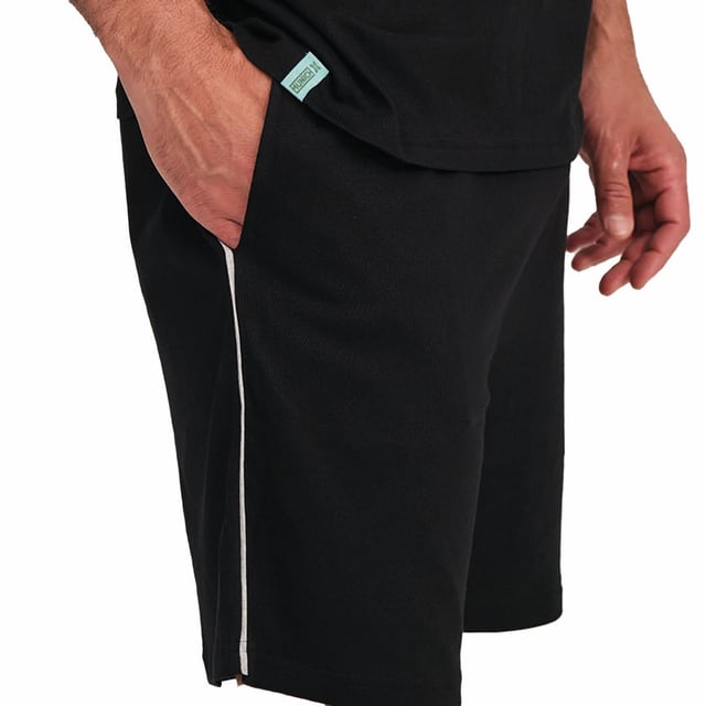 These men's short-sleeved pajamas combine comfort and style in a fresh and relaxed set, perfect for resting in comfort and looking good even at home.

 Details:

 T-shirt:
 - Relaxed fit.
 - Round neck.
 - Short sleeve.
 - Front print.

 Short:
 - Short and baggy.
 - Side pockets.
 - Elastic waistband.
 - Light and cool fabric for the warmest nights.
 - Tone-on-tone visible seams.

 For those seeking a restful night's sleep, MUNICH's luxurious short-sleeved pyjama sets are just the ticket. Crafted from the finest fabrics and with an attention to detail unmatched in the industry, these comfortable and stylish men's short-sleeved pyjamas will ensure you sleep in luxury each and every night.
 Composition: T-shirt: 50% Modal, 50% Cotton; Shorts: 50% Modal, 50% Cotton
 Care:
Machine wash max. 30ºC.
 Use mild detergent.
 Avoid bleaches.
 Dry at low temperature.
 Iron at low temperature.