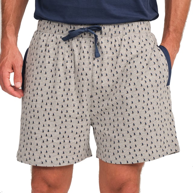 Enjoy a restful night's sleep in this stylish and comfortable men's pyjama set. Designed to provide maximum comfort without compromising on style, this men's pyjama set combines a short-sleeved T-shirt with shorts, perfect for lazy nights and relaxing at home.

 Details:

 T-shirt:
 - Relaxed fit.
 - Round neck with button placket.
 - Short sleeve.
 - Lightweight and breathable fabric.

 Short:
 - Short and baggy.
 - Side pockets.
 - Adjustable elastic waistband with drawstring.
 - Light and cool fabric for the warmest nights.
 - Tone-on-tone visible seams.

 For those seeking a restful night's sleep, J and J Brothers's luxurious short sleeve pyjama sets are just the ticket. Crafted from the finest fabrics and with an attention to detail unmatched in the industry, these comfortable and stylish men's short sleeve pyjamas will ensure you get a luxurious night's sleep each and every night.
 Composition: T-shirt: 100% Cotton; Shorts: 90% Cotton, 10% Viscose
 Care:
Machine wash max. 30ºC.
 Use mild detergent.
 Avoid bleaches.
 Dry at low temperature.
 Iron at low temperature.