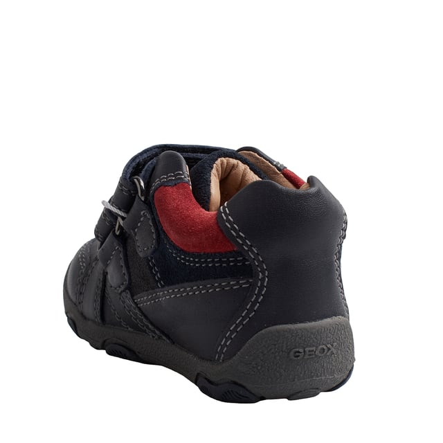 The Geox boys' sneakers combine modern design and comfort to accompany little ones on their daily adventures. With a sporty style and attractive colors, these boys' sneakers offer a versatile and functional look.

 Details:
 - Breathable.
 - Closure type: Double velcro.
 - Non-slip sole.
 - Made of leather.
 - The perforated sole allows feet to breathe naturally.
 - Shock-absorbing antibacterial insole.
 - Flexy system.
 - Geox Breathe: Technology designed to ensure the best possible air circulation and maintain optimal body temperature. The system provides maximum comfort thanks to breathability and a high degree of temperature regulation.

 The Geox kids' sneakers are the perfect combination of style, comfort, and functionality. Their sporty design with hook-and-loop closure makes them easy to wear every day, while the Geox's breathable technology keeps feet cool and comfortable.
 Composition: Exterior: Leather, Suede; Interior: Leather; Sole: Rubber; Insole: Leather
 Care:
Use a damp cloth or soft brush.
 Do not machine wash.
 Let it air dry, without direct sunlight or heat.