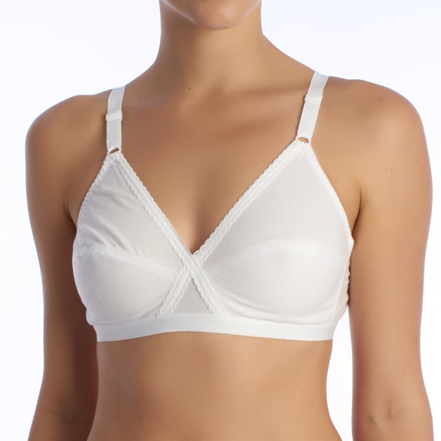 The classic non-wired bra is the perfect choice for those seeking comfort and a natural fit without complications. Its non-wired design provides a feeling of lightness and freedom, allowing for a smooth fit that adapts perfectly to the body without adding unnecessary bulk.

 The breathable material prevents irritation and ensures a comfortable fit. Its seamless construction provides a clean, discreet finish, making it ideal for wearing under any outfit, from T-shirts to blouses.

 Main features:
 - Non-wired and non-padded design for greater comfort.
 - Breathable material that ensures freshness and prevents irritation.
 - Natural and flexible fit, ideal for everyday use.
 - Adjustable straps.
 - 3-position, 2-row rear closure.
 - Clean, discreet finish that won't show under clothing.
 - Easy maintenance and durability.

 Ideal for everyday wear, this non-wired women's bra ensures unrestricted support, allowing for natural, comfortable movement all day long.
 Composition: 65% Polyester, 35% Cotton
 Care:
- Hand wash.
 - Do not use bleach.
 - Do not use a dryer.
 - Do not iron.
 - Do not dry clean.