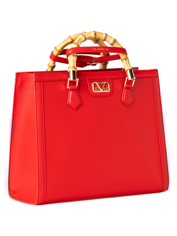 19v69 ITALIA handtas HEIDI combineert klassiek design met een moderne twist. Het bamboe handvat, de gouden details en felle kleuren maken het een stijlvolle blikvanger voor elke gelegenheid.