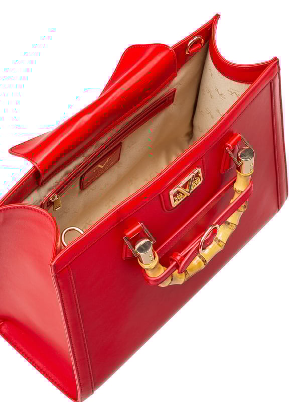 19v69 ITALIA handtas HEIDI combineert klassiek design met een moderne twist. Het bamboe handvat, de gouden details en felle kleuren maken het een stijlvolle blikvanger voor elke gelegenheid.