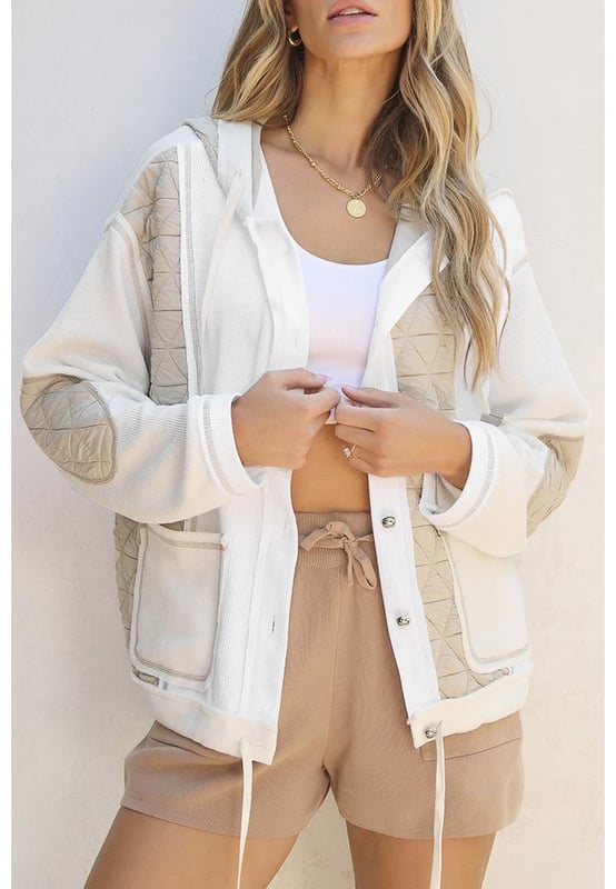 Our styles are designed with a trendy fitted look in mind following an international size standard. For the best fit we suggest choosing one size up from your usual. Be sure to check our sizing chart to find your perfect match!
  Buttoned jacket for easy and adjustable wear
  Quilted design for a cozy feel
  Textured fabric adds depth and visual interest
  Loose fit for a comfortable and relaxed silhouette
  Hooded design for extra coverage
Material: 95% Polyester 5% Elastane