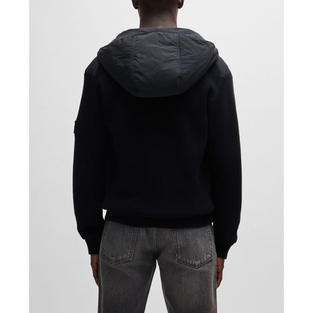 Mens BOSS Kalbero Relaxed Fit Padded Jacket in black.new seasonal design quilting on a light weight padded nylon - sleeves and back in half cardigan rib - double rib hem and cuffs with outside linking - front zip attached on top - visible press button with logo at pockets - squared logo at back inside - light weight padded hood with elasticated binding at opening - new herringbone logo patch at sleeve - 94% cotton 5% polyamide 1% elastane