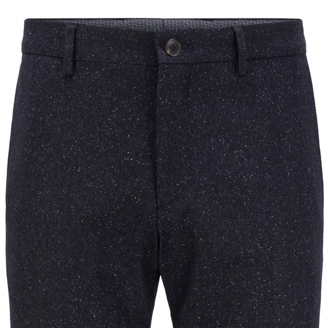 Zip fly and button fastening.Belt loops.Side pockets.Slim fit.
