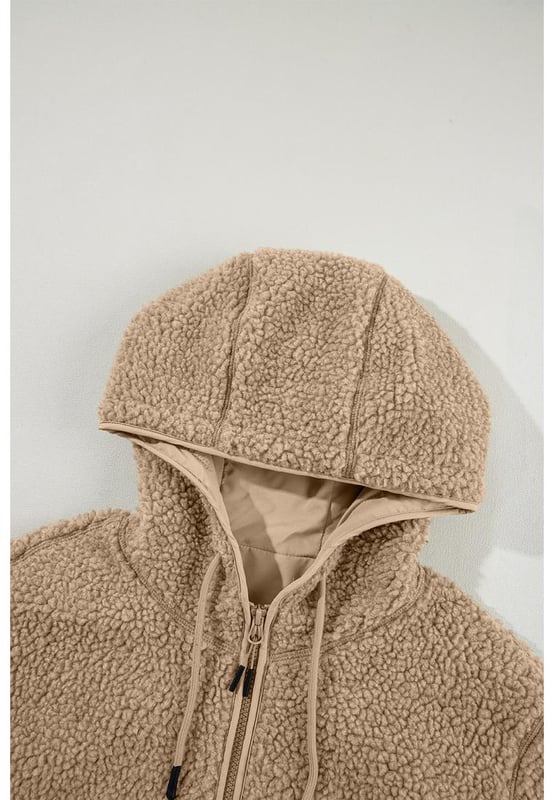 Pale Khaki Fleece Zip Up Drawstring Hooded Pocketed Jacket
  Adjustable hood with drawstring for a personalized fit
  Convenient side pockets for storing essentials
  Versatile piece for layering or wearing on its own
  Perfect for chilly days and cozy nights
Material: 100% Polyester