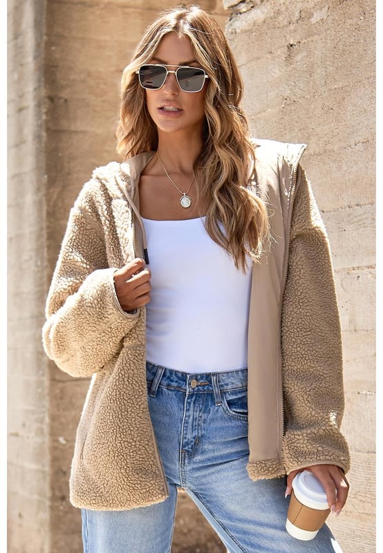 Pale Khaki Fleece Zip Up Drawstring Hooded Pocketed Jacket
  Adjustable hood with drawstring for a personalized fit
  Convenient side pockets for storing essentials
  Versatile piece for layering or wearing on its own
  Perfect for chilly days and cozy nights
Material: 100% Polyester