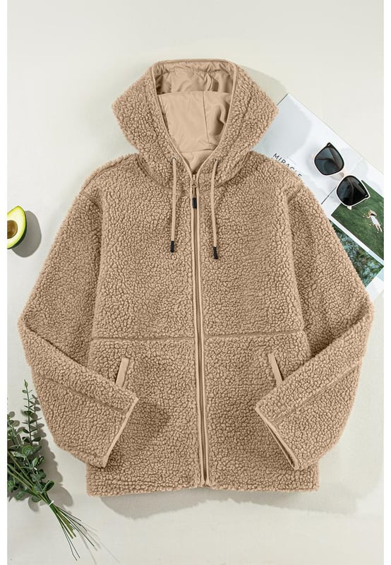 Pale Khaki Fleece Zip Up Drawstring Hooded Pocketed Jacket
  Adjustable hood with drawstring for a personalized fit
  Convenient side pockets for storing essentials
  Versatile piece for layering or wearing on its own
  Perfect for chilly days and cozy nights
Material: 100% Polyester