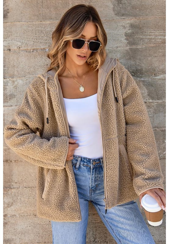 Pale Khaki Fleece Zip Up Drawstring Hooded Pocketed Jacket
  Adjustable hood with drawstring for a personalized fit
  Convenient side pockets for storing essentials
  Versatile piece for layering or wearing on its own
  Perfect for chilly days and cozy nights
Material: 100% Polyester