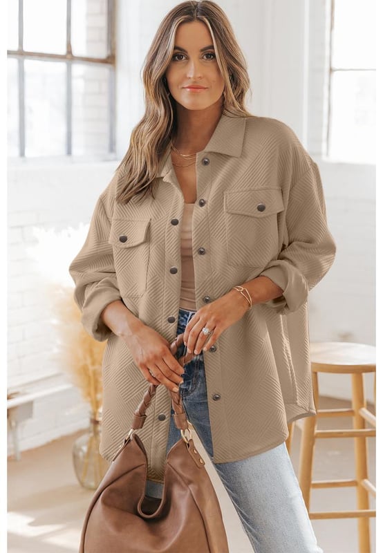 Solid jacket ensures easy coordination with your existing wardrobe
  Crafted from a textured fabric adding visual interest and depth
  Turn
  down collar for a classic touch
  Perfect for transitional weather or layering
  Available for women
Material: 95% Polyester 5% Elastane