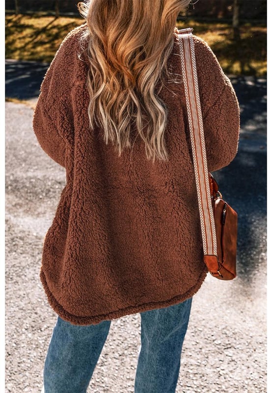 Our styles are designed with a trendy fitted look in mind following an international size standard. For the best fit we suggest choosing one size up from your usual. Be sure to check our sizing chart to find your perfect match!
  Luxurious sherpa plush material for ultimate warmth and comfort
  Adorable teddy bear style adds a playful touch to your outfit
  Convenient snap button closure for easy wear and a secure fit
  Classic collared design for a timeless and stylish look