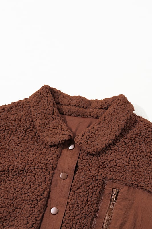 Our styles are designed with a trendy fitted look in mind following an international size standard. For the best fit we suggest choosing one size up from your usual. Be sure to check our sizing chart to find your perfect match!
  Luxurious sherpa plush material for ultimate warmth and comfort
  Adorable teddy bear style adds a playful touch to your outfit
  Convenient snap button closure for easy wear and a secure fit
  Classic collared design for a timeless and stylish look