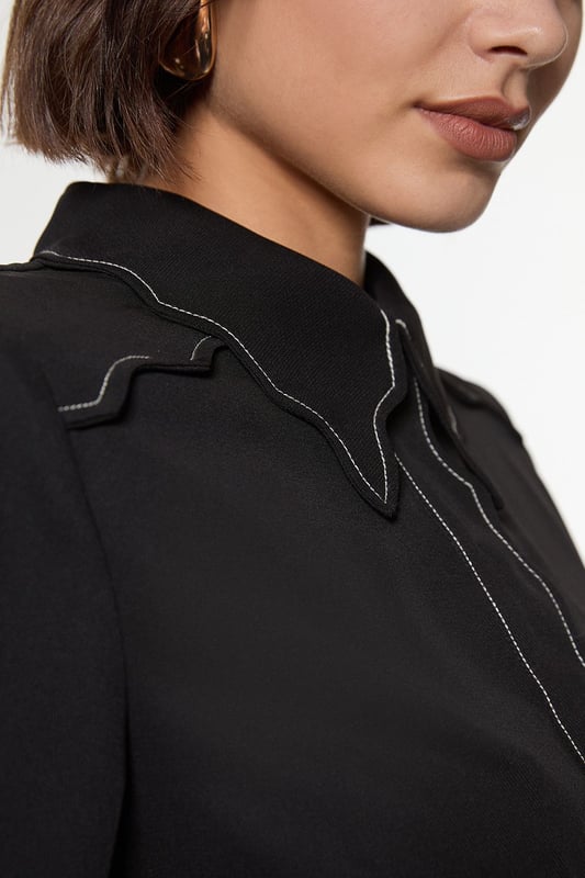 Add a little formality in our blouse. The scalloped design gives a playful yet elevated feel, and the relaxed silhouette makes for a comfortable blouse that can be worn from day to night. This piece pairs well with anything, from a flowing maxi skirt, to tailored trousers, to jeans for an elevated daytime look. Scallop Trim Woven Crepe Blouse High Quality Crepe Fabric Textured, Scalloped Details High, Collared Neckline Relaxed Fit Contrast Stitch Detailing