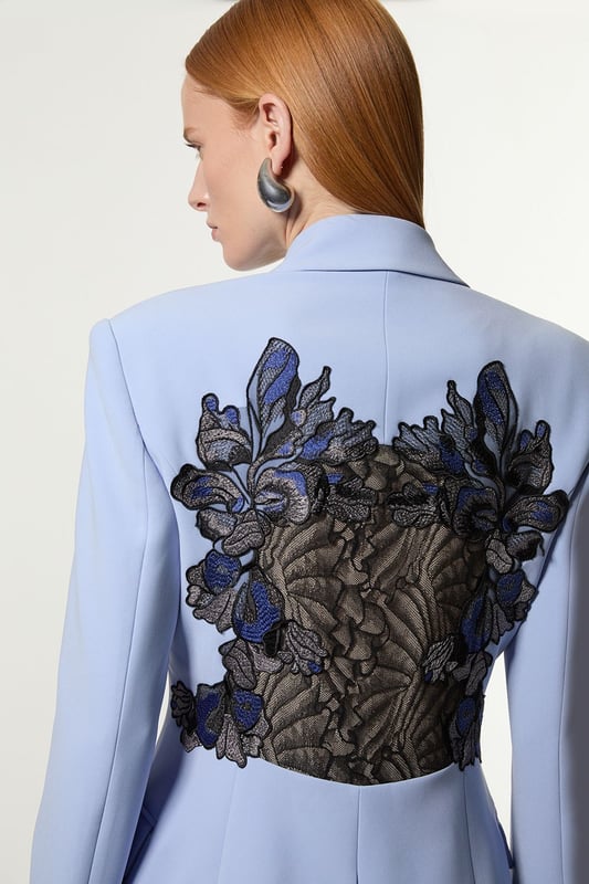 From statement glamour to understated elegance, this latest selection of occasion wear covers every moment. High-impact details serve the dramatic dresser, while sleek tailoring and monochrome combinations cater to those with a polished and pared-back aesthetic. Make a statement with our striking blazer, which features a dramatic, applique design and double breasted buttons. Style it simply with the matching trousers and heeled boots or statement heels for a look that will take you from race days to party season events. Lace Applique Contrast Tailored Tuxedo Jacket Flattering Fitted Silhouette V Neckline Contrasting Lace Applique Accent and Buttons Classic Double Breasted Button Detailing Matching Trousers Sold SeparatelyDiscover our collection of occasion wear or browse our range of women's occasion dresses now.