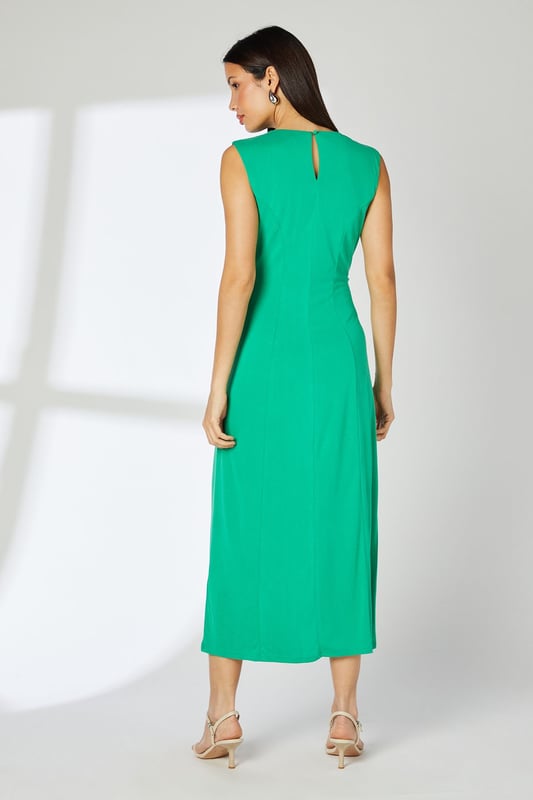 Elegant twist waist detail creates a flattering silhouette
        Sleeveless design with classic crew neckline
        Midi length offers versatile styling options
        Soft jersey fabric provides comfortable all-day wear
        Subtle keyhole detail at back adds a refined touch
    
    This sophisticated twist waist midi dress from Principles combines effortless style with everyday comfort. The clever waist detailing creates a figure-enhancing silhouette that works beautifully for various daytime occasions. Style with strappy sandals and statement earrings as shown for casual gatherings, or dress down with white trainers and a denim jacket for weekend brunches. The versatile midi length makes it perfect for family celebrations or garden parties when paired with a lightweight cardigan and delicate jewellery. The stretchy jersey fabric ensures this dress moves with you throughout the day, whilst maintaining its shape. A wardrobe essential that transitions seamlessly from office to evening drinks with a simple change of accessories.