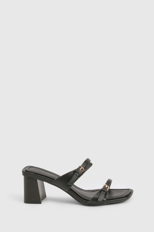 Chic block heel design for comfortable all-day wear
        Adjustable ankle strap with buckle closure for a secure fit
        Versatile low heel height between 2.5 and 4.5cm
        Sleek square toe for a modern, on-trend look
        Multiple thin straps across the foot for added style and support
    
    Step out in style with these versatile block heel sandals, perfect for the fashion-forward woman who values both comfort and trend-setting looks. The low heel height offers stability and ease of movement, making these an ideal choice for various occasions. Pair them with a flowing maxi dress for a bohemian-inspired daytime ensemble, or team them with cropped trousers and a blazer for a smart-casual office look. The adjustable ankle strap ensures a customised fit, while the multiple thin straps add a touch of elegance to your feet. These sandals effortlessly transition from day to night, making them a must-have addition to your wardrobe. Whether you're attending a casual garden party or meeting friends for brunch, these heels will keep you looking chic and feeling confident all day long.