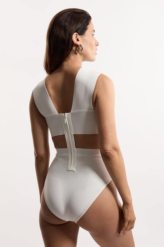 Whilst appropriate for a beach destination, please note that in order to ensure enduring quality, this piece is not recommended for swimming.Style: Cut Out SwimsuitDesign: Plain