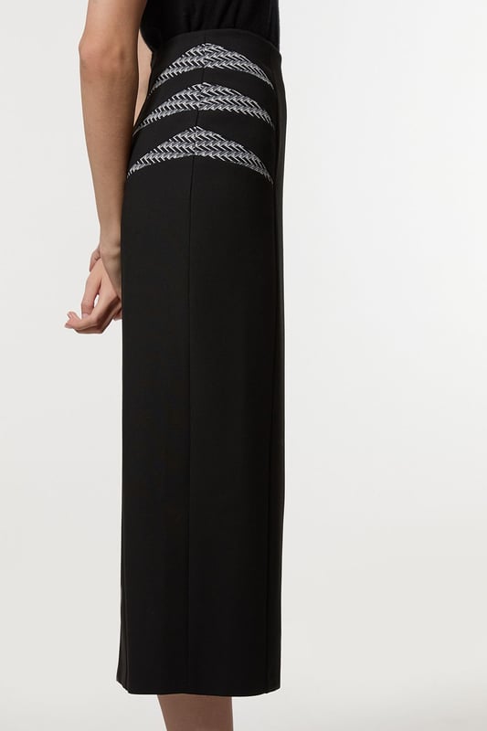 Experience updated wardrobe essentials with our midi skirt, with a straight silhouette and a high waistline, creating a universally flattering fit. The jacquard detailing adds immediate intrigue, elevating this piece beyond a basic. Style this piece with anything, from the matching jacket and strappy heels, to a knit jumper, tights, and boots. Compact Stretch Jacquard Insert Midi Pencil Skirt Sleek, Minimal Design Comfortable High Waistline Flattering Straight Silhouette Unique Insert Details on Hips Zip Back Fastening Matching Jacket Sold Separately