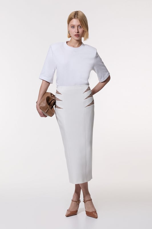 Compact Stretch Jacquard Insert Midi Pencil Skirt Experience updated wardrobe essentials with our midi skirt, with a straight silhouette and a high waistline, creating a universally flattering fit. The jacquard detailing adds immediate intrigue, elevating this piece beyond a basic. Style this piece with anything, from the matching jacket and strappy heels, to a knit jumper, tights, and boots. Compact Stretch Jacquard Insert Midi Pencil Skirt Sleek, Minimal Design Comfortable High Waistline Flattering Straight Silhouette Unique Insert Details on Hips Zip Back Fastening Matching Jacket Sold Separately