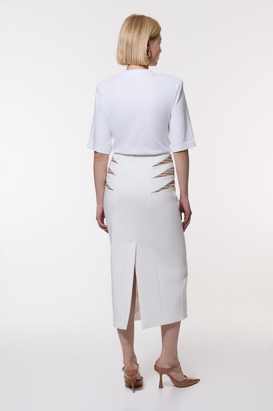 Compact Stretch Jacquard Insert Midi Pencil Skirt Experience updated wardrobe essentials with our midi skirt, with a straight silhouette and a high waistline, creating a universally flattering fit. The jacquard detailing adds immediate intrigue, elevating this piece beyond a basic. Style this piece with anything, from the matching jacket and strappy heels, to a knit jumper, tights, and boots. Compact Stretch Jacquard Insert Midi Pencil Skirt Sleek, Minimal Design Comfortable High Waistline Flattering Straight Silhouette Unique Insert Details on Hips Zip Back Fastening Matching Jacket Sold Separately