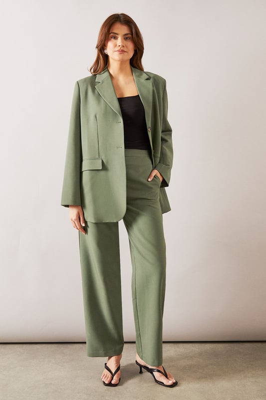 Tailored tapered design for a sophisticated silhouette
        Comfortable regular fit with a flattering waistline
        Versatile woven fabric suitable for various occasions
        Sleek side pockets for practicality and style
        Full-length trousers with a modern straight leg
    
    Embrace effortless elegance with these tailored tapered trousers from Wallis. Perfect for the woman who appreciates both comfort and style, these trousers offer a regular fit that flatters various body types. The tapered design creates a sleek silhouette, making them ideal for casual daywear or smart-casual events. Style them with a crisp white blouse and trainers for a chic everyday look, or pair them with a matching blazer for a coordinated ensemble that's perfect for family gatherings or casual work environments. The versatile nature of these trousers allows for easy transition from day to night - simply swap your flats for a pair of low heels and add some statement jewellery for an evening out. With their timeless design and comfortable fit, these trousers are sure to become a staple in your wardrobe, offering endless styling possibilities for the sophisticated woman on the go.