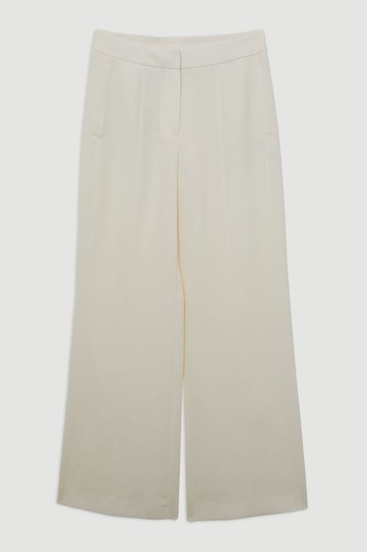 Experience elevated tailoring in a pair of straight leg trousers, featuring a flattering, relaxed fit, seam detailing for a seamless fit, and a comfortable high waistline. The sleek design makes them easy to style with anything, from a crisp button up shirt for a formal look, or with a T-shirt and trainers for a more laid back approach. Tailored Crepe Seam Detail Straight Leg Trousers High Quality Crepe Fabric Comfortable High Waistline Flattering Straight Leg Fit Statement, Pronounced Seam Detailing Pocket Accents Sleek, Minimal Design