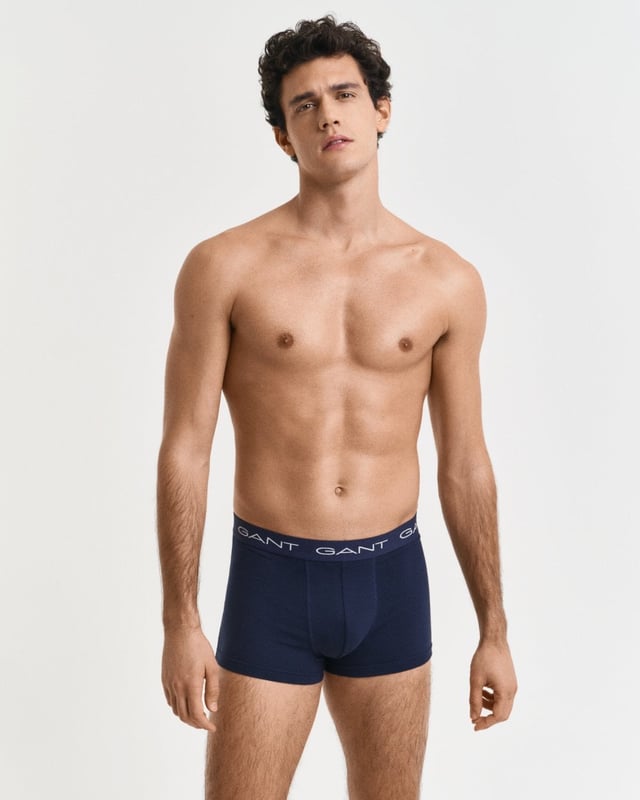 GANT's underwear delivers supportive, comfortable fits in high-quality fabrics. These cotton jersey trunks from GANT arrive in a 3-pack of classic, solid colors. They have a slim fit, regular waist and short leg length. Each trunk features a jacquard-knitted elastic waistband detailed with repeating GANT logos.

Pack of three
Slim fit
Short leg length
Regular waist
Jacquard-knitted waistband
GANT logos at waistband

 95% Cotton, 5% Elastane 

900023003
 
 