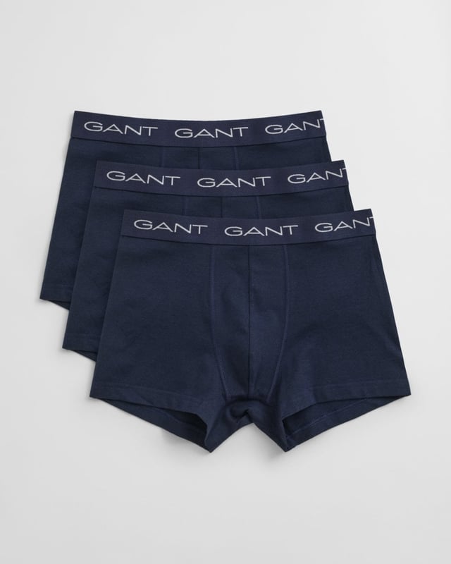 GANT's underwear delivers supportive, comfortable fits in high-quality fabrics. These cotton jersey trunks from GANT arrive in a 3-pack of classic, solid colors. They have a slim fit, regular waist and short leg length. Each trunk features a jacquard-knitted elastic waistband detailed with repeating GANT logos.

Pack of three
Slim fit
Short leg length
Regular waist
Jacquard-knitted waistband
GANT logos at waistband

 95% Cotton, 5% Elastane 

900023003
 
 