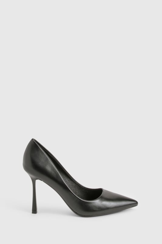 Sleek pointed toe design for a contemporary silhouette
        Elegant stiletto heel measuring between 7-9cm for comfortable height
        Smooth PU finish that maintains its polished appearance
        Classic slip-on style for effortless wear
        Versatile court shoe shape that complements any outfit
    
    These sophisticated pumps are the ultimate wardrobe essential that transition seamlessly from day to night. The pointed toe and perfectly proportioned heel create a flattering line that elongates the leg whilst maintaining comfort for all-day wear. Style with tailored trousers and a crisp blouse for office sophistication, or pair with your favourite jeans and a statement top for evening drinks. For special occasions, these versatile heels complement both midi and mini dresses beautifully. The sleek design works wonderfully with both structured and flowing garments, making these pumps a true style chameleon in your collection. Their timeless appeal ensures they'll remain a go-to choice season after season, offering endless styling possibilities for the fashion-forward woman.