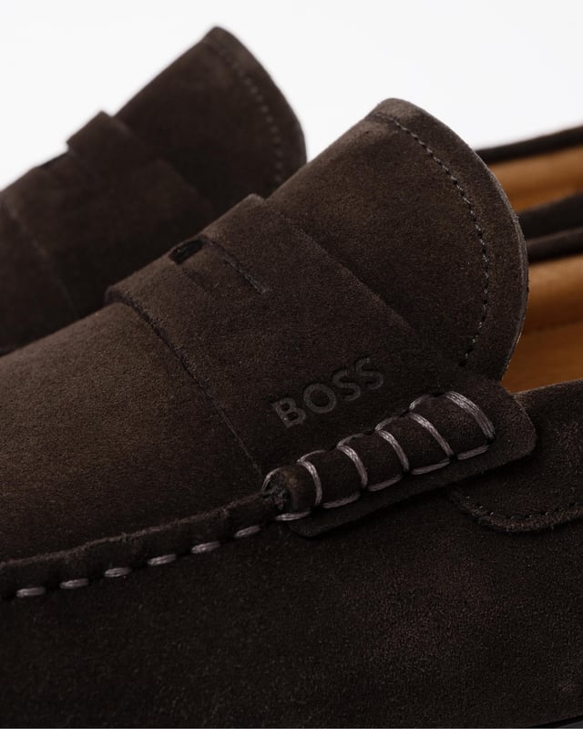 Crafted in soft suede for comfort, these timeless BOSS Menswear loafers have a flexible moccasin construction with great traction. Penny trim featuring embossed logo.

Fastening top: Slip-on
Fully lined
Packaging: Box

Upper material: 100% Cow skin, Lining: 90% Polyamide, 10% Polyurethane, Sole: 100% Thermoplastic polyurethane, Innersole: 90% Polyamide, 10% Polyurethane
50541750