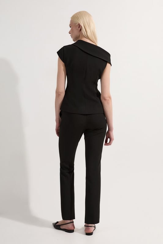 These Karen Millen Compact Stretch Slim Leg Tailored Trousers are the epitome of refined workwear. The slim fit design creates a streamlined look that's both modern and professional. Perfect for the office, these trousers can be styled with a crisp white shirt and blazer for a classic ensemble. The stretch fabric ensures all-day comfort, allowing you to move with ease from morning meetings to evening functions. For a more relaxed yet put-together look, pair with a silk blouse and pointed flats. The versatility of these trousers makes them a wardrobe staple, easily transitioning from day to night with a simple change of accessories. Whether you're presenting to clients or attending a business dinner, these trousers will help you project confidence and sophistication.  Slim leg tailored trousers for a sleek silhouette Compact stretch fabric for comfort and ease of movement Versatile design suitable for various professional settings Clean-cut waistband for a polished appearance Full-length style with a sophisticated straight leg
