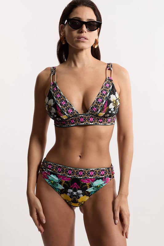 Get holiday ready with our bikini top, featuring a flattering plunge neckline, floral pattern, and ring detail. Pair with the matching bikini bottoms, a beach cover-up, and sandals for a day at the pool, or dress it up with wedges and jewellery for an elegant beach club look. Mirror Print Plunge Bikini Top Ring Detail Vibrant Floral Print Plunge Neckline Thick, Supportive Straps Matching Bottoms Sold Seperately
