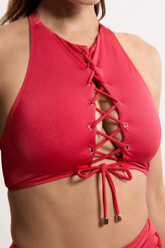 Experience elevated confidence in our halter neck bikini. This piece features a supportive design, accentuated with a strappy design and a secure full coverage design. Style this piece with the matching bikini bottoms and strappy sandals for a holiday outfit perfect for beach clubs, pool parties, and spa days. Slinky Tie Detail Bikini Top Supportive, Wide Shoulder Straps Statement Stitched Design Comfortable, Wide Shoulder Straps SecureFull Coverage Design Halter Bikini Top Style Metallic Clasp Fastenings in Back Matching Bikini Bottoms Sold Separately