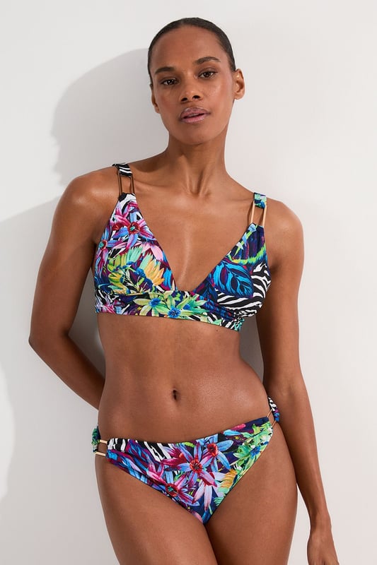 Make a splash this season with Karen Millen's eye-catching Tropical Floral Plunge Bikini Top. This striking piece combines an exotic floral pattern with zebra print elements. The plunging neckline adds a touch of allure, perfect for those seeking to make a statement poolside or on the beach. Adjustable straps ensure a customised fit, while the supportive under-bust band provides comfort for all-day wear. Whether you're lounging by the pool or enjoying a beachside cocktail, this bikini top is perfect for sunny days. Pair it with the matching bottoms for a coordinated look, or mix it up with a solid-coloured bottom to showcase your personal style. This Karen Millen piece is sure to become your go-to swimwear for hot destinations and summer getaways.  Vibrant tropical floral print with bold zebra accents Plunging neckline for a daring and alluring look Adjustable straps with sleek metal hardware Supportive under-bust band for enhanced comfort Versatile design suitable for mix-and-match styling